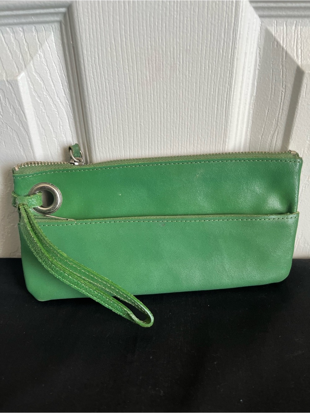 Green wristlet with 2 zippers